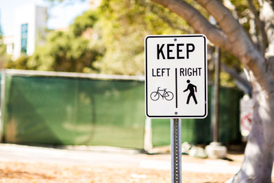 Keep left or right pedestrian sign.